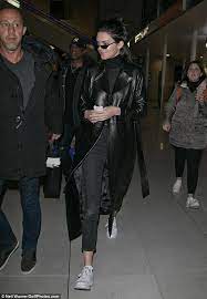 Kendall Jenner Arrives In Paris Dressed Like Something From The Matrix In 2021 Leather Coat Outfit Coat Outfit Casual Trench Coats Women