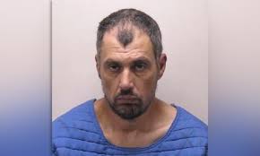 Terrorism charges in bloody knife attack at Michigan Walmart