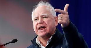 Tucker Carlson says Tim Walz is clearly gay & Democrats are forcing him to  stay in the closet