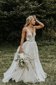 Floral wedding dresses with romantic details give classic weddings a whimsical touch. 20 Extraordinary Floral Wedding Dresses Millennial Brides Will Love Praise Wedding