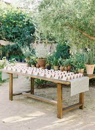 This Destination Garden Wedding Took Place During Pride Weekend In Palm Springs California Wedding Seating Chart Display Casual Wedding Wedding Seating
