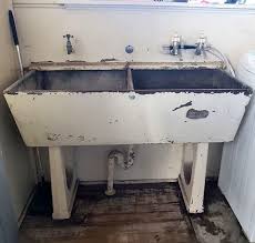 Copper boiler for washing clothes. Old Double Concrete Laundry Tub West Coast New Zealand History