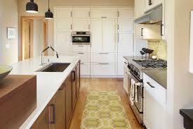 All white with stainless steel and a very tall ceiling Bland To Grand L Shaped Contemporary Kitchen Remodel In High Point Estates Madison Wi