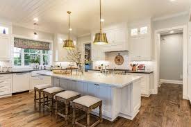 White kitchen island cart with walnut topped cheesecake. Farmhouse Kitchen With White Kitchen Island Completed With Storage And Chairs L Sha White Kitchen Remodeling Farmhouse Kitchen Design Stools For Kitchen Island