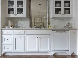 Dishwashers can be located away from the sink cabinet, but generally they need to be within a few feet so the sink plumbing can be used for the water supply and drain. Mirror Behind Kitchen Sink French Kitchen Lisa Luby Ryan