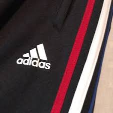 This take on 2016's it sneaker features a white primeknit upper to complement its boost midsole, with red and blue tabs providing hits of flashy color. Adidas Pants Jumpsuits Adidas Red White Blue Striped Joggers Poshmark