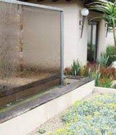 This gives the visual impression, that there is not a wall at all: 17 Diy Glass Water Wall Ideas Water Walls Glass Waterfall Waterfalls Backyard