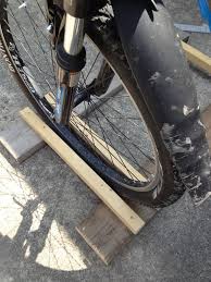 I saw a couple builds using the cheap cargo bar as the basis. Wood Bike Rack 5 Steps Instructables