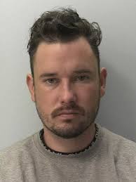 Brave shopkeeper told robbers to 'get out'