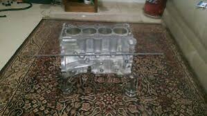 A great way to teach your kids how a valvetrain works, and why you should keep your fingers away built by warwick andrews, this table started out as the engine from a 2006 bmw 750i and has some wheels on the bottom so he can actually move. Engine Block Coffee Table Toyota Corolla Engine Ebay