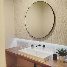 Round wall mirrors make your home appear and feel more spacious. Bathroom Collective On Instagram Wsrenovations Bathroom Taps Interiordesign Australia Round Mirror Bathroom Timber Vanity Bathroom Design