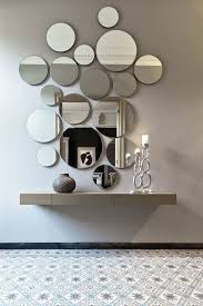 Take wall decor to new heights when hanging this round pierre wall mirror from abbyson. 27 Gorgeous Wall Mirrors To Make A Statement Digsdigs