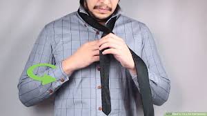 Admitting you can't tie a tie can sometimes be a little embarrassing. How To Tie A Tie Half Windsor 14 Steps With Pictures Wikihow