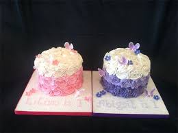 Beautiful Birthday Cake For Twins Brother And Sister Ombre Pink And Purple Cakes For Twin S First Birthday Twin Birthday Cakes First Birthday Cakes Twins 1st Birthdays