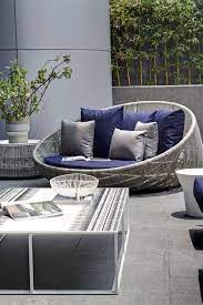 Be it a verdant garden, a spacious patio, or a balcony with a view, every home will have a window to the world outside. Grey Wicker Love Seat With Navy Cushions Look Great Together Modern Outdoor Patio Outdoor Patio Furniture Sets Modern Outdoor Furniture