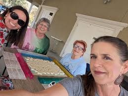 Ladies play mahjong in the heat