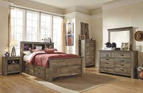 If you love country living, the trinell queen panel bed matches your authenticity. Trinell Brown Youth Bookcase Storage Bedroom Set 1stopbedrooms