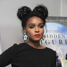 Janelle Monae Is Slaying This Natural Hair Style With Two Buns And Hair Accessories Click Above Natural Hair Styles Natural Hair Accessories Natural Hair Updo