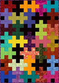 Choose the level of difficulty by changing the number of pieces. Make A Colorful Jigsaw Puzzle Quilt With This Free And Easy Pattern Scrap Quilt Patterns Puzzle Quilt Colorful Quilts Patterns