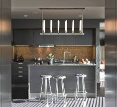 9 Ideas For Backsplash Materials You Can Install In Your Kitchen Black Kitchen Cabinets Black Cabinets Stone Backsplash Kitchen