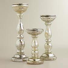 The mercury glass candle holders have a silver finish and metal accents. Amalie Silver Mercury Glass Pillar Candle Holders Glass Pillar Candle Tall Glass Pillar Candle Holders Mercury Glass Pillar Candle Holders