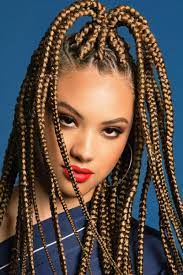 These Triangular Box Braids Are Straight Up Fire Cosmopolitan Com Africanbraids Triangle Box Braids Long Box Braids Box Braids Pictures