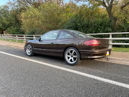 Image result for Black Gold 1995 Saturn