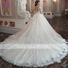 Saw something that caught your attention? Fsuzwel Gorgeous Appliques Chapel Train Lace Ball Gown Wedding Dress 2020 Sexy Scoop Neck Long Sleeve Beaded Princess Bride Gown Wedding Dresses Aliexpress