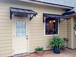 The Are The Classic Bronze Metal Awnings With The Single S Scrolls Metal Awning House Awnings Custom Awnings