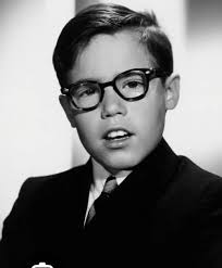 I somehow always thought these two were the same person. The left is  Charles Martin Smith, early photo (movie The Untouchables) and the right,  Barry Livingston who played Ernie, My Three Sons. |