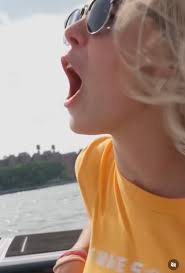 Hawk Tuah' Girl Hailey Welch received an apology from met fans after  finding out she was there for a veterans dog charity who she had given a  donation of $50k too.