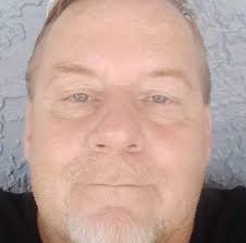 What to do if a neighbor is taking pictures of my underage daughter in our  backyard?