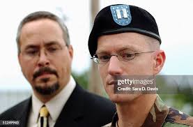 Pfc. Lynndie England's military defense attorney Cpt. Jonathan Crisp...  News Photo