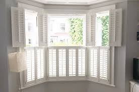 Tier On Tier Gallery The London Shutter Company London Shutters Window Shutters In Uk In 2019 Bay Window Living Room Interior Windows Interior Window Shutters
