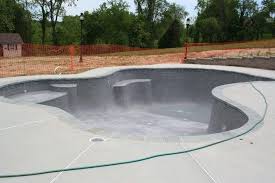 A truly outstanding pool finish is durable, comfortable, easily maintained, and it enhances your poolscape environment while complementing your home. Pool With Medium Gray Plaster Pool Shapes Amazing Swimming Pools Desert Landscaping