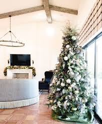 Sparkly Bows And Mistletoe We Love This Gorgeous Green Holiday Design Christmasinteriordecora Christmas Interiors Holiday Decor Interior Decorating Services