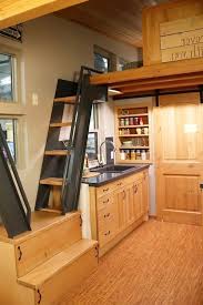 The inside has been painted white to make the interior space appear larger. Tiny House Ideas Inside Tiny Houses Pictures Of Tiny Homes Inside And Out Videos Too Tiny House Loft Inside Tiny Houses Tiny House Interior Design