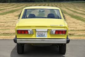 Image result for Herald Yellow 1974 Subaru