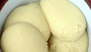 bowl of foutou igname sweet potato leaves mafe recipe mashed plantains