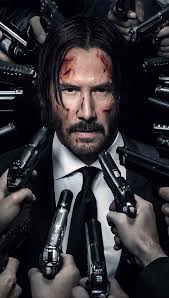 Who would win in a hand-to-hand combat between Bruce Wayne and John Wick?