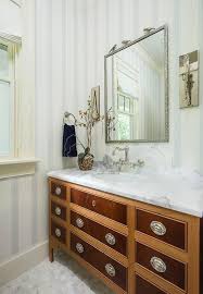 A Charming French Two Tone Bath Vanity Is Accented With Oval Inset Pulls And A White Marble Count Bathroom Design Small Apartment Bathroom Bathroom Inspiration