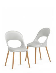 For visual interest, try one that mixes stains—a natural wood apron with legs stained in white or black. Beech Wood Dining Chairs M S