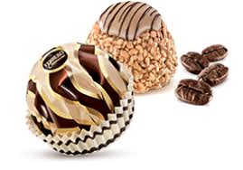 A delicious combination of tastes and textures from fine wafer and rich creamy cocoa filling to a dark chocolate heart. Ferrero Pralines Golden Gallery