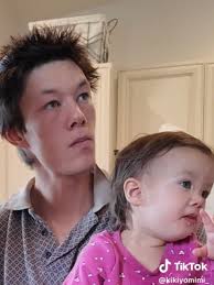 Kiyomi and Micah Holding Suni