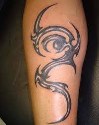 Covered up tribal tattoos such as hips and chest tattoos are more sacred in nature. Cool Arm Tattoos For Men The Black And White Tribal Tattoo Design Tribal Tattoos Tattoos For Guys Tattoo Arm Designs
