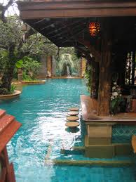 Our server ruwan, was amazing, he was polite, and was quick to. Pool Bar In A Tropical Paradise Lined By Abstract Vegetation And Defined By Beautifully Colored Tile And Wood Technews Dream Pools Cool Pools Dream Backyard