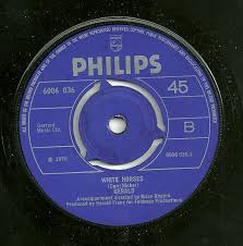 That S When I Softly Sigh Plain Or Pan I am quite astounded that my recording of the white horses theme song is still being played and much sought after. plain or pan