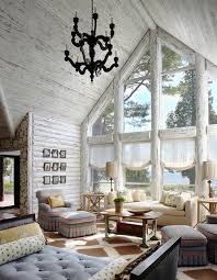 Inside of a rustic wooden alpine hut or cabin, austria. Charming Lakefront Log Cabin With Whitewashed Interiors