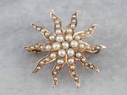 gold and pearl brooch
