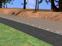 Lay out the first layer of cinder blocks. How To Construct A Block Retaining Wall 14 Steps With Pictures